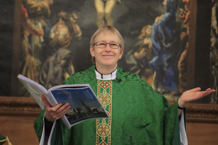 Rector Alison Joyce blessing the congregation at Sunday Choral Eucharist