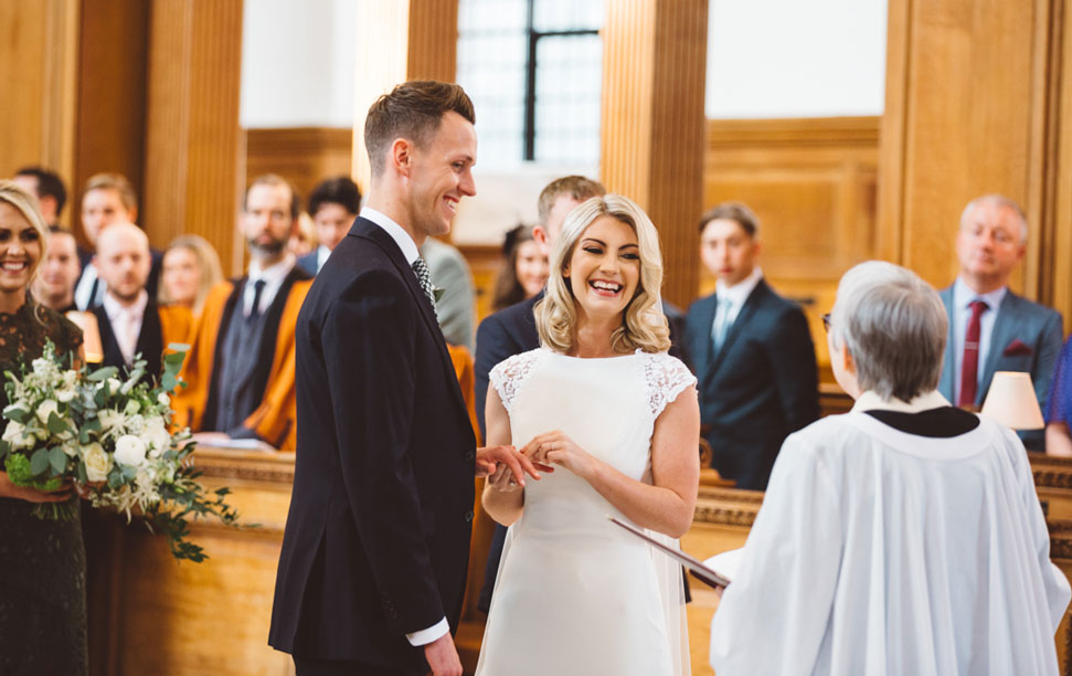 Exchanging rings in a wedding service at St Bride's