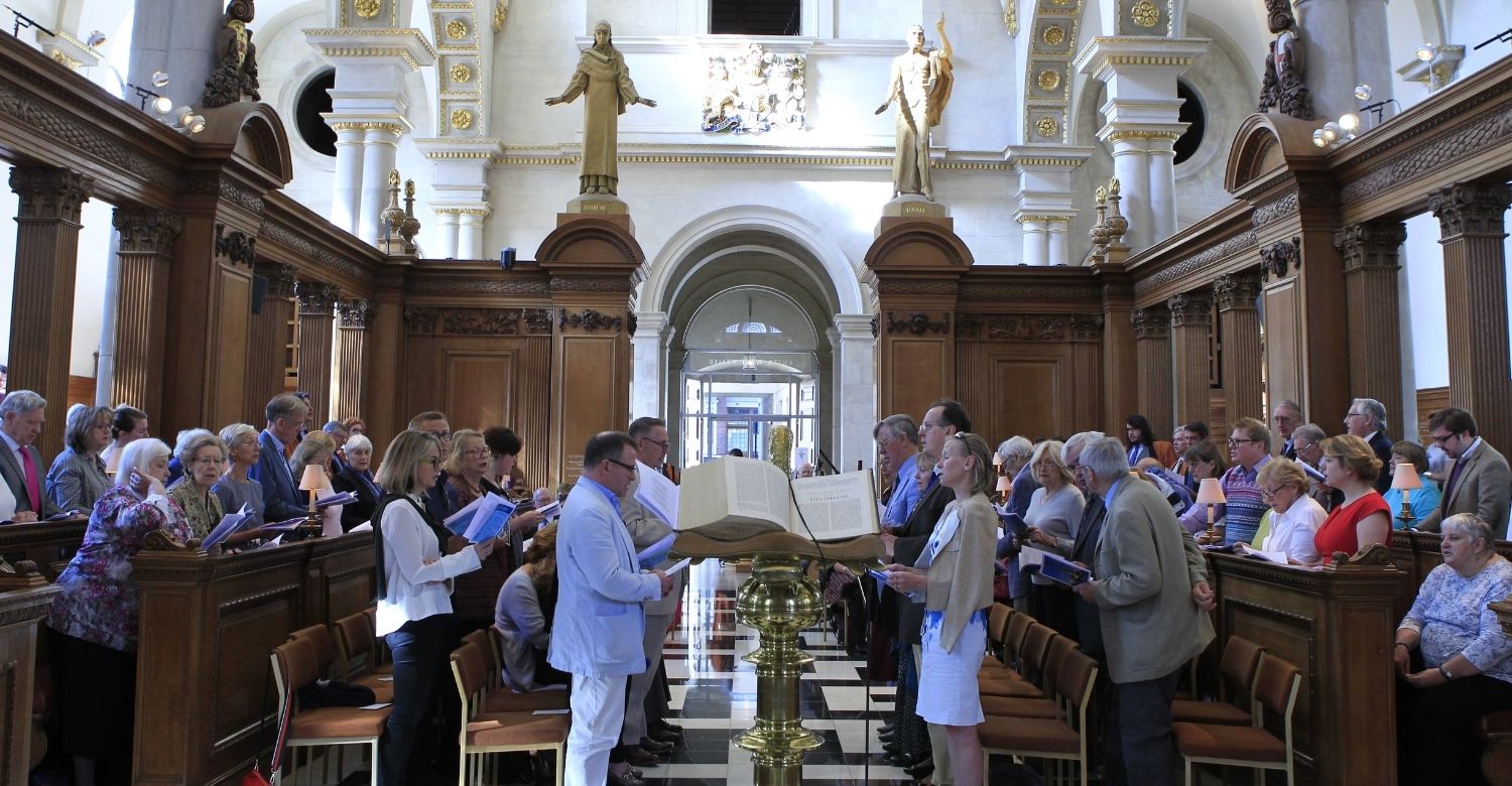 View to the West end of St Bride's of congregation singing