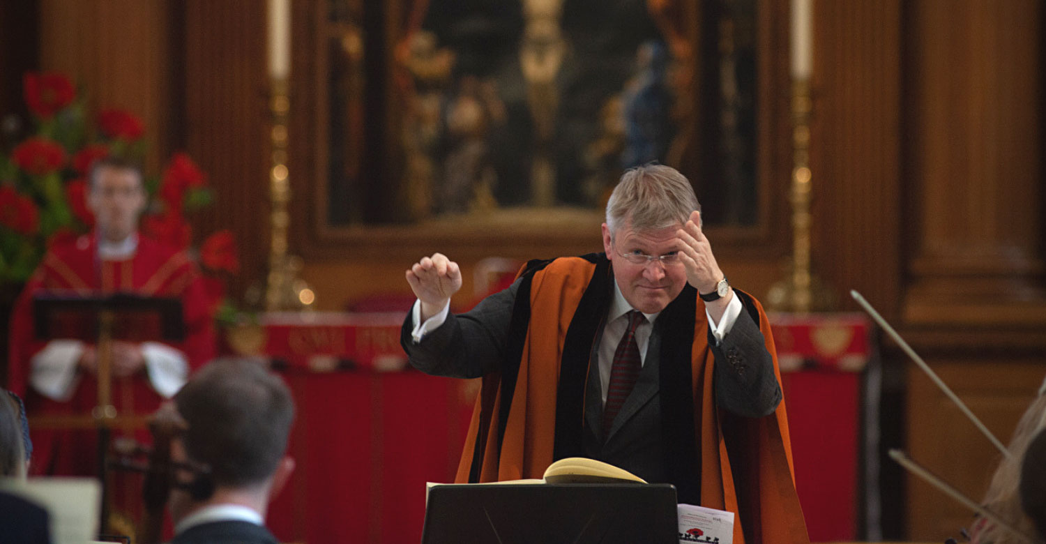 Matthew Morley conducting orchestra