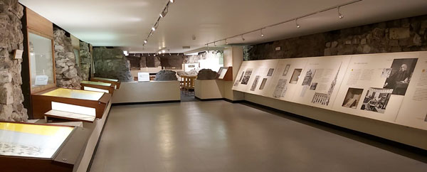 crypt museum display cases and information panels