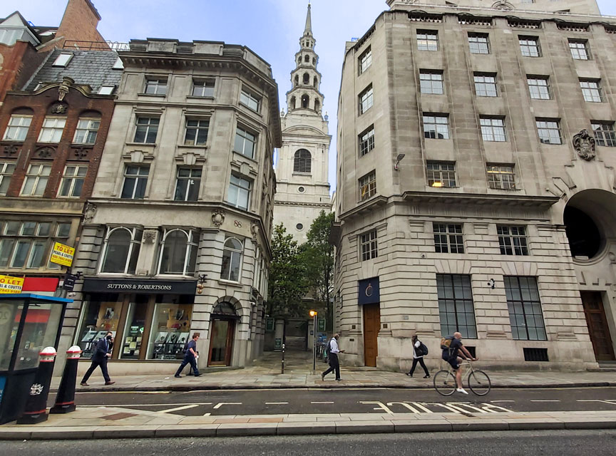View of St Bride's between buildings from Fleet Street
