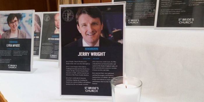Jerry Wright memorial plaque next to candle