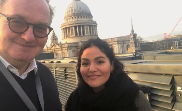 Sela Musa and Simon Greaves on the roof of the FT building with St Paul's Dome rising behind them