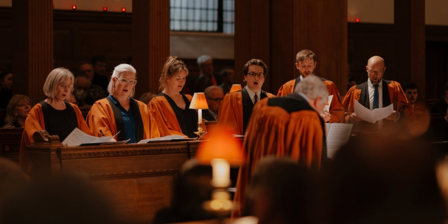 St Bride's Choir singing, conducted by Robert Jones, in a carol service at St Bride's Church